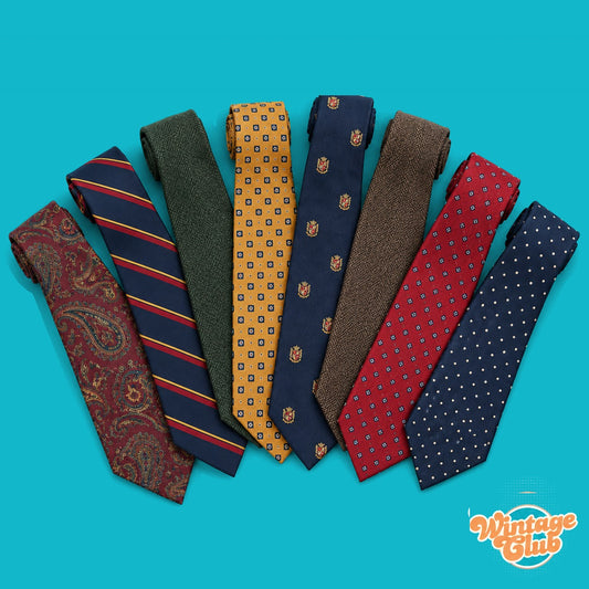 KiloBox Cravatte Vintage al Kg WintageClub — cravatte vintage in seta e lana: paisley, regimental, stemmi, pois e tinta unita